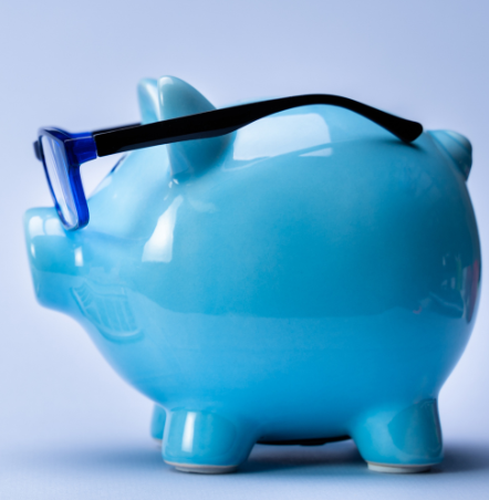 Blue ceramic piggy bank with glasses 